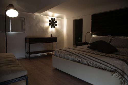 Ένα ή περισσότερα κρεβάτια σε δωμάτιο στο Palazzo Mandurino luxury relais