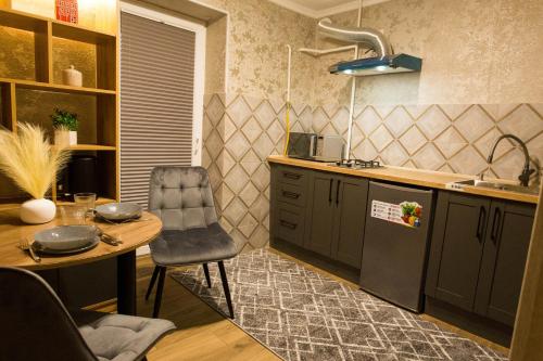 Køkken eller tekøkken på Prestige Apartament near thermal pool