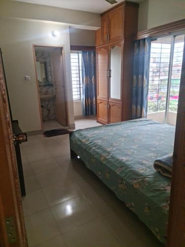 Llit o llits en una habitació de Jannat Villa