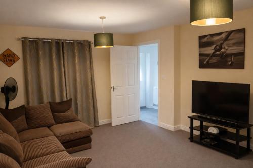 Et tv og/eller underholdning på Cosy 2-Bedroom House
