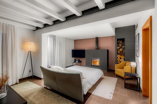 Orizontes View Hotel tesisinde bir odada yatak veya yataklar