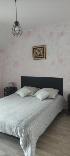 Giường trong phòng chung tại Gîte la Forge