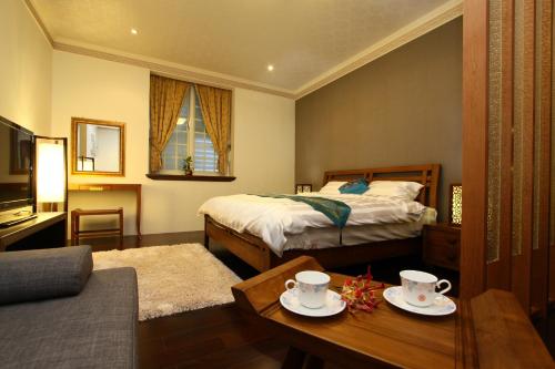 Postel nebo postele na pokoji v ubytování Star Shine B&B
