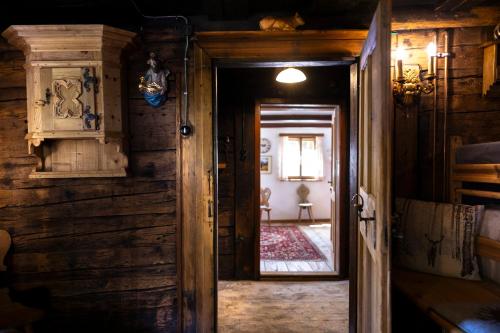 an open door into a room with a room with a room at Chalet Mühlburger in Gruben
