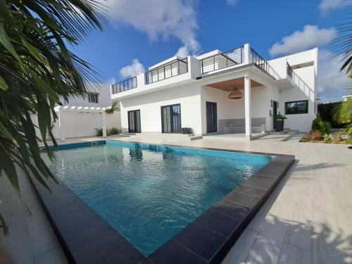 Piscina a Keur Kibibi o a prop