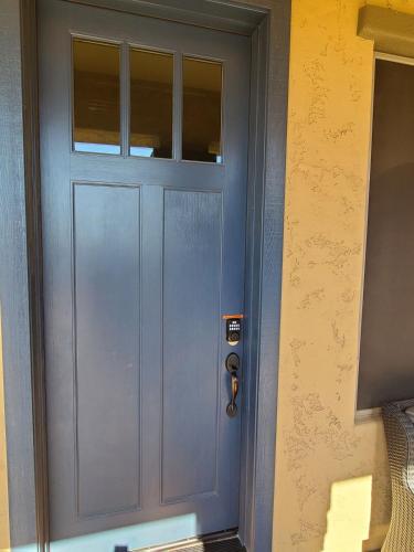 a blue door with a handle in a room at Guest House Suite Phoenix-Cave Creek in Phoenix