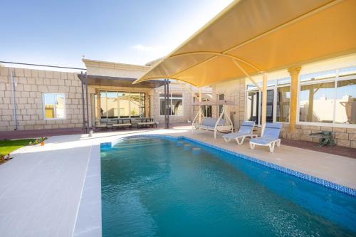 4BR Luxury villa with private pool and Majlis