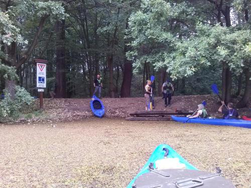 a group of people playing in kayaks in a park at Agroturystyka "U Źródła" in Milicz