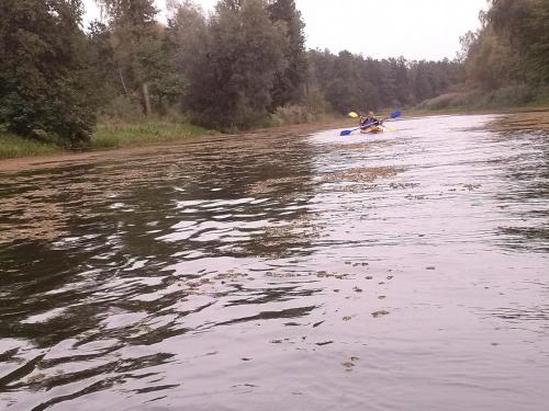a person in a kayak on a river at Agroturystyka "U Źródła" in Milicz