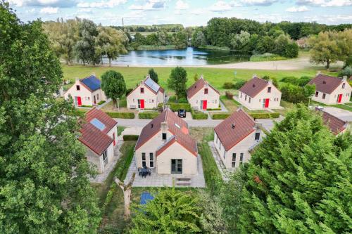 an aerial view of a large estate with houses at 6 - Person Lake Area 28 Bungalow in Ewijk