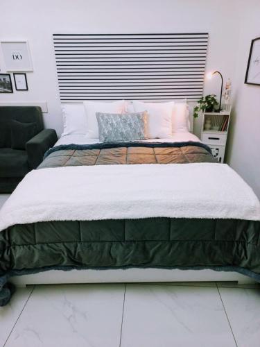 a bedroom with a large bed in a room at Marinella House Napoli centro Piazza Dante in Naples