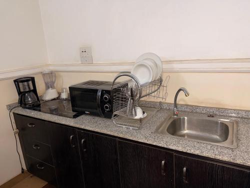 Køkken eller tekøkken på Sentinels Apartment and Suites by STEFANOS