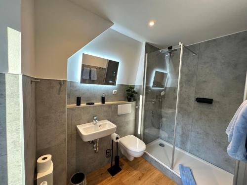 Et badeværelse på Strandvilla Miramare