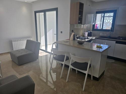 Et opholdsområde på Luxueux Appartement pieds dans l'eau