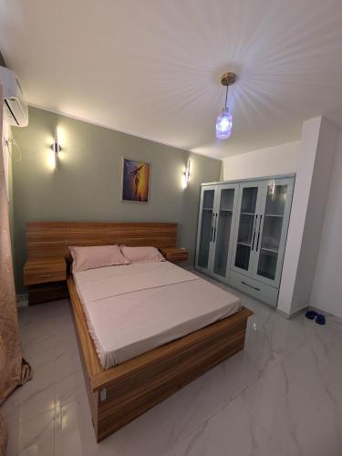Llit o llits en una habitació de Résidence Tasseng