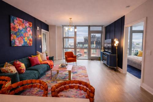 a living room with a couch and a table at The Casa - U Street in Washington, D.C.