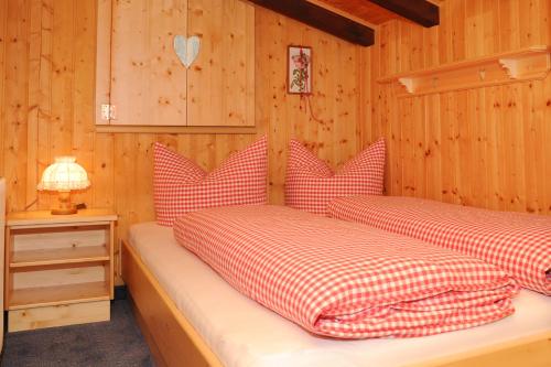 En eller flere senge i et værelse på Appartment Valnova / Barga