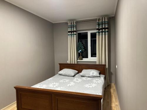 En eller flere senge i et værelse på ZWIN Apartment 3