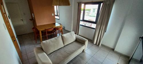 Et opholdsområde på Edificio Aura con cochera, A mts del shopping, casino y el puerto!!