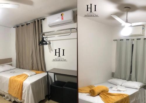 Giường trong phòng chung tại Hospedaria Ipiranga