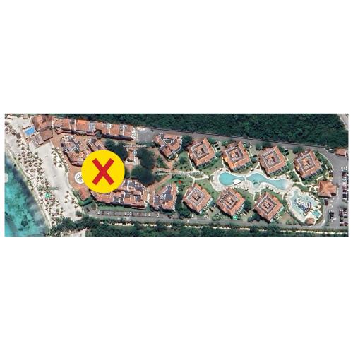 an aerial view of a resort with a x sign at 2BR 2BA Beachfront With View 71 in Bayahibe
