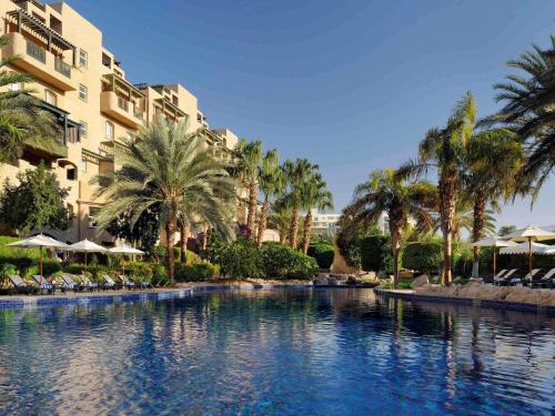 Poolen vid eller i närheten av Mövenpick Resort & Residences Aqaba