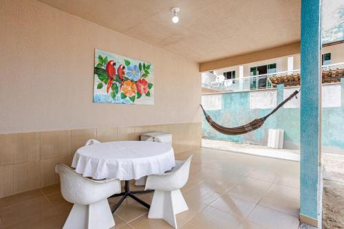 En eller flere senge i et værelse på Aluga-se casa por diarias