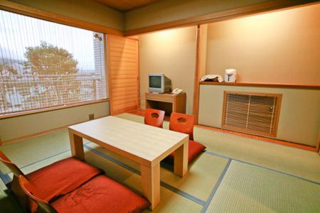 a small room with a table and two chairs at Shiki Resort Prego Hayama in Hayama