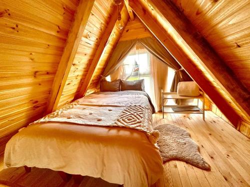 Postel nebo postele na pokoji v ubytování Cabañas RyL2