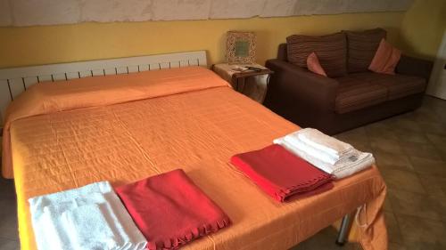 Ένα ή περισσότερα κρεβάτια σε δωμάτιο στο Volte di Pietra
