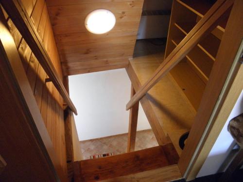 an overhead view of a wooden staircase in a house at Penzion U Štěpána in Lužice