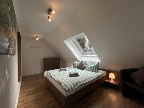 En eller flere senge i et værelse på Zur Mühle