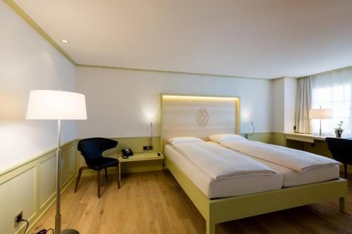 Katil atau katil-katil dalam bilik di Hotel Krone Speicher