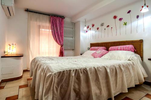 Katil atau katil-katil dalam bilik di Alloggio Turistico RIGGIOLE