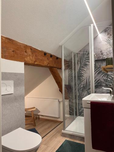 a bathroom with a sink and a toilet in a room at Alpenheimat 1658 in Mittelberg