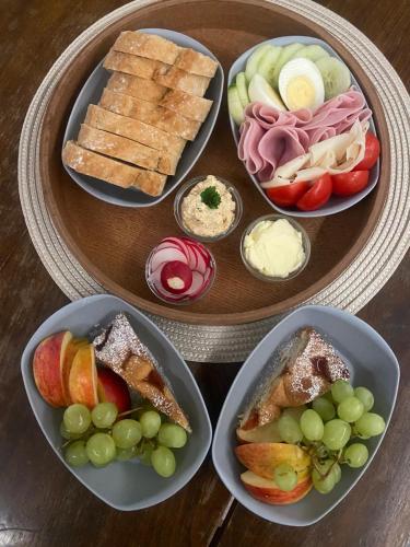 a plate of food with different types of food on it at penzion LILIE in Litomyšl