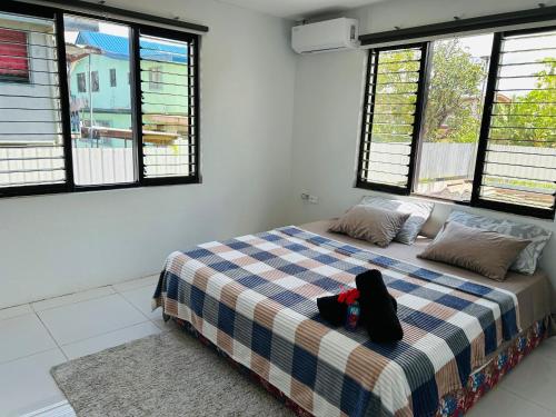 En eller flere senge i et værelse på Residence 50 Apartment Nausori