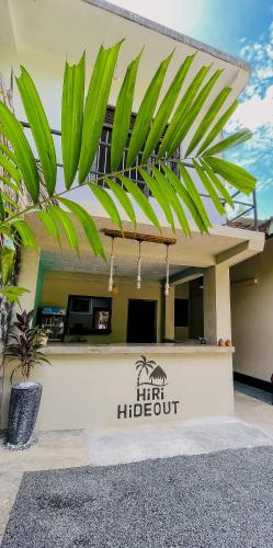 a first hideout sign in front of a building at Hiri Hideout in Dickwella