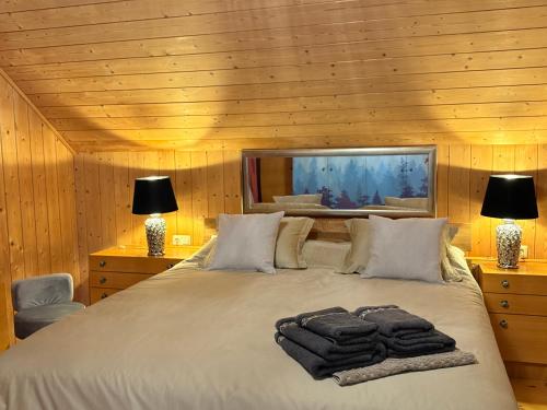 En eller flere senge i et værelse på Villa Verdi