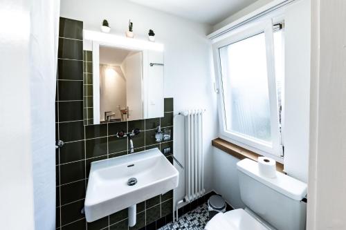 Et badeværelse på Max Apartments