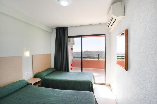 Foto La Caseta Apartments 6