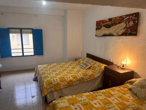 En eller flere senge i et værelse på La Casa los Trancos, a 15 minutos de Cazorla