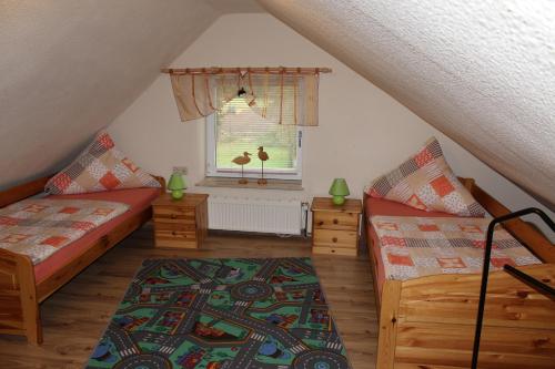Postel nebo postele na pokoji v ubytování Haus Küstenheide