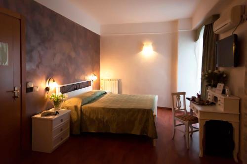 Postel nebo postele na pokoji v ubytování Park Hotel