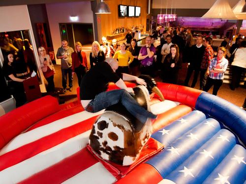 a man is on a inflatable wrestle at Hotell Södra Berget in Sundsvall