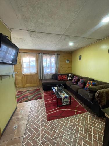 Khu vực ghế ngồi tại Casa Cabaña Oro Rayado Puerto Varas