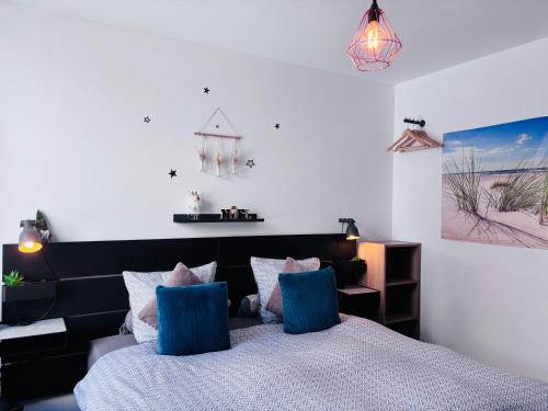 Giường trong phòng chung tại Chez Isa