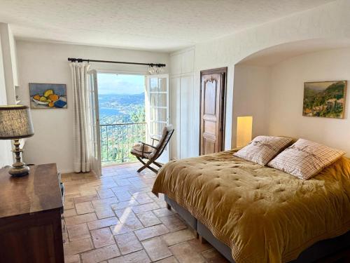 Llit o llits en una habitació de Villa vue imprenable