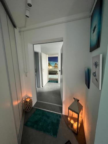 a hallway of a house with a view of the ocean at Moderne Unterkunft mit Wellnessflair in Bodelshausen