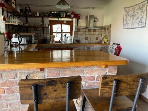 Køkken eller tekøkken på Bogáncs Vendégház - Nagybörzsöny